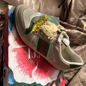 Brand new Gucci sneakers with removable charm